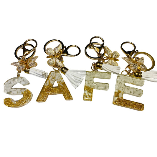 Add an Elegant Gold and Seashell Letter to Personalize your Keychain Sets!